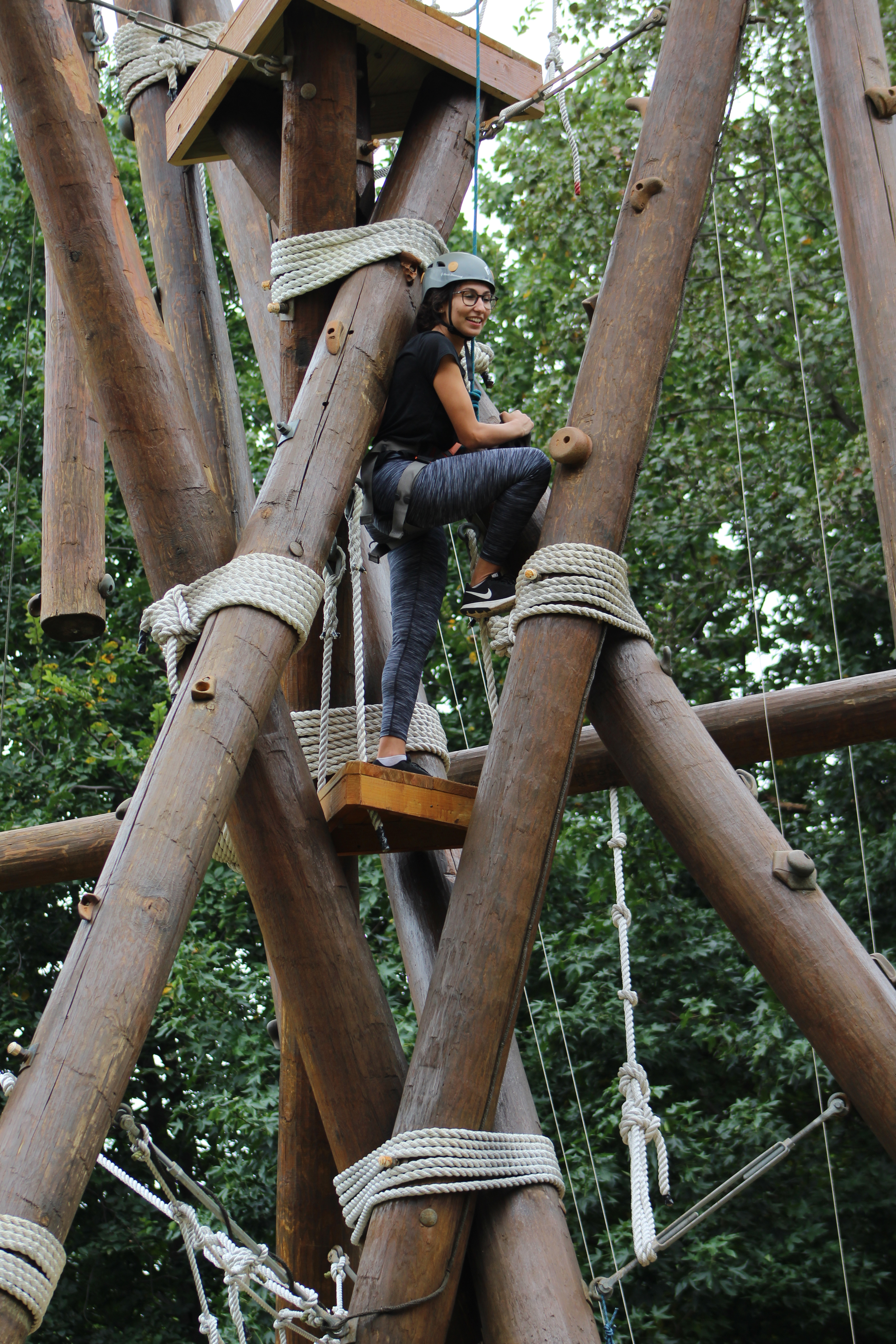 Girl climbing structure
